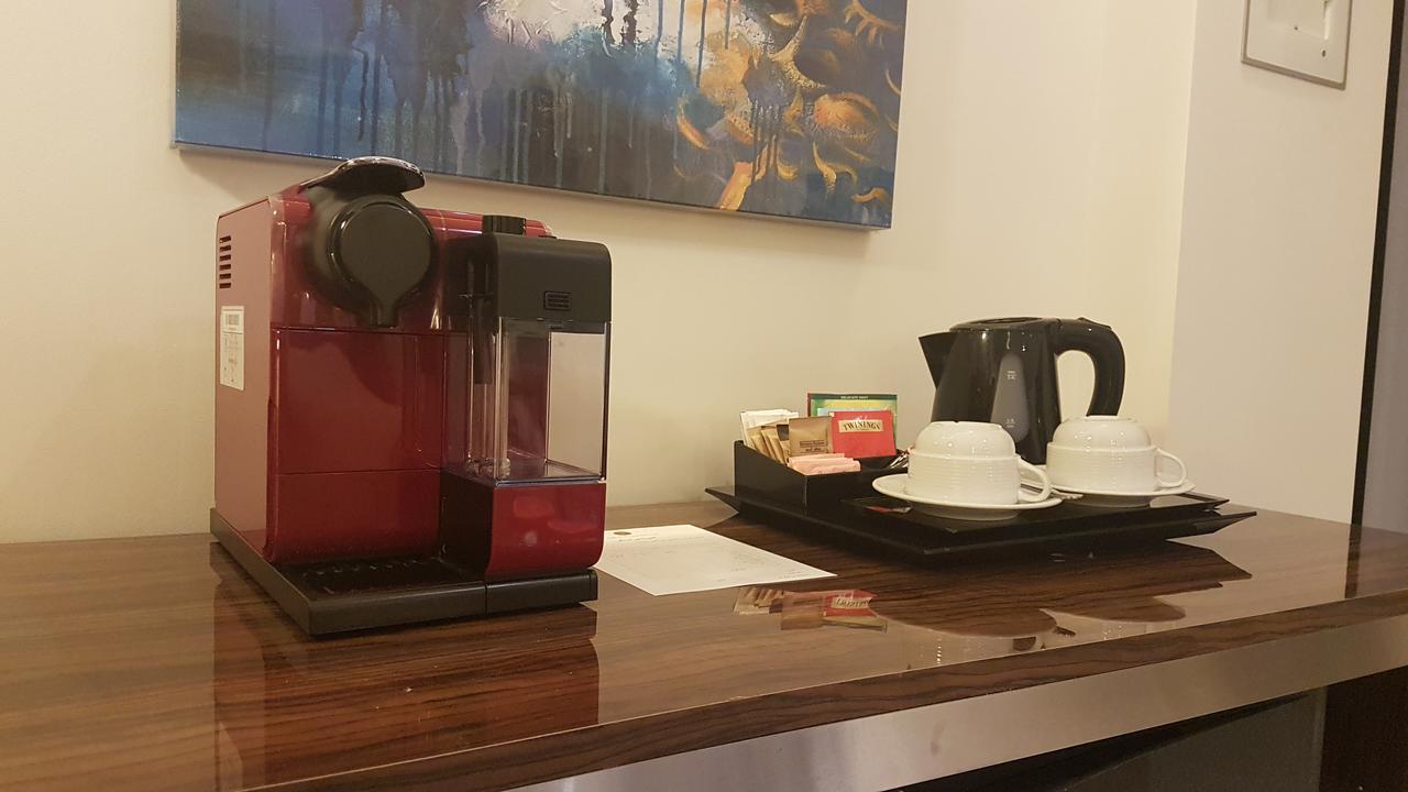 Tio Sea Resort Al Khor Exterior foto A Nespresso coffee machine in a hotel room